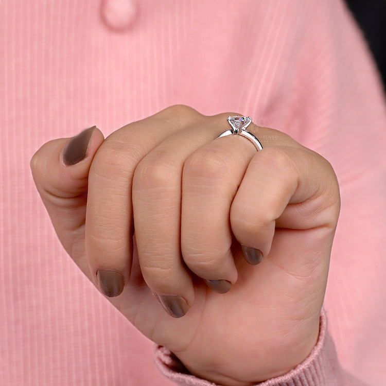 White gold cushion ring with IGI-certified lab diamond.
