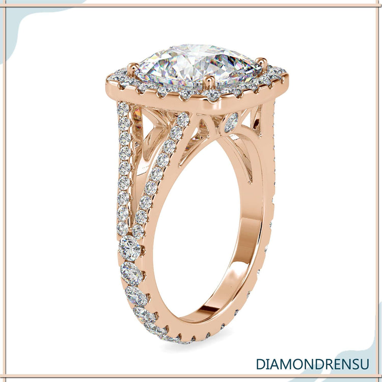 Yellow gold ring with round diamond halo setting.
