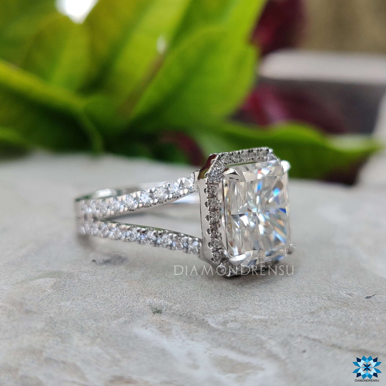 Custom radiant cut engagement ring in white gold.
