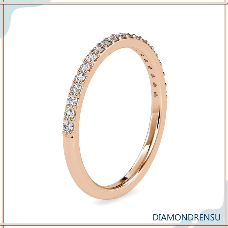 Minimalist diamond ring for wedding or stacking use.
