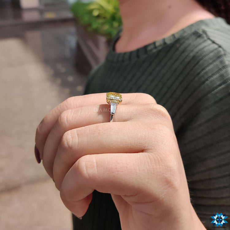 Buy moissanite ring with tapered baguette side stones.
