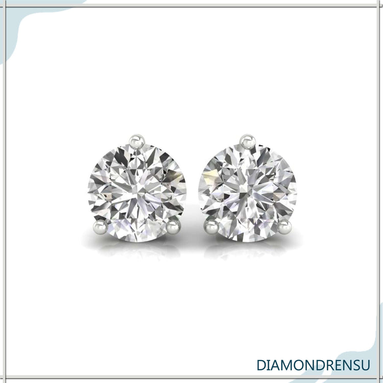 Stud diamond earrings crafted in rose gold.
