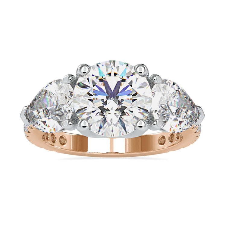 Lab diamond ring with round centre stone in rose gold setting.
