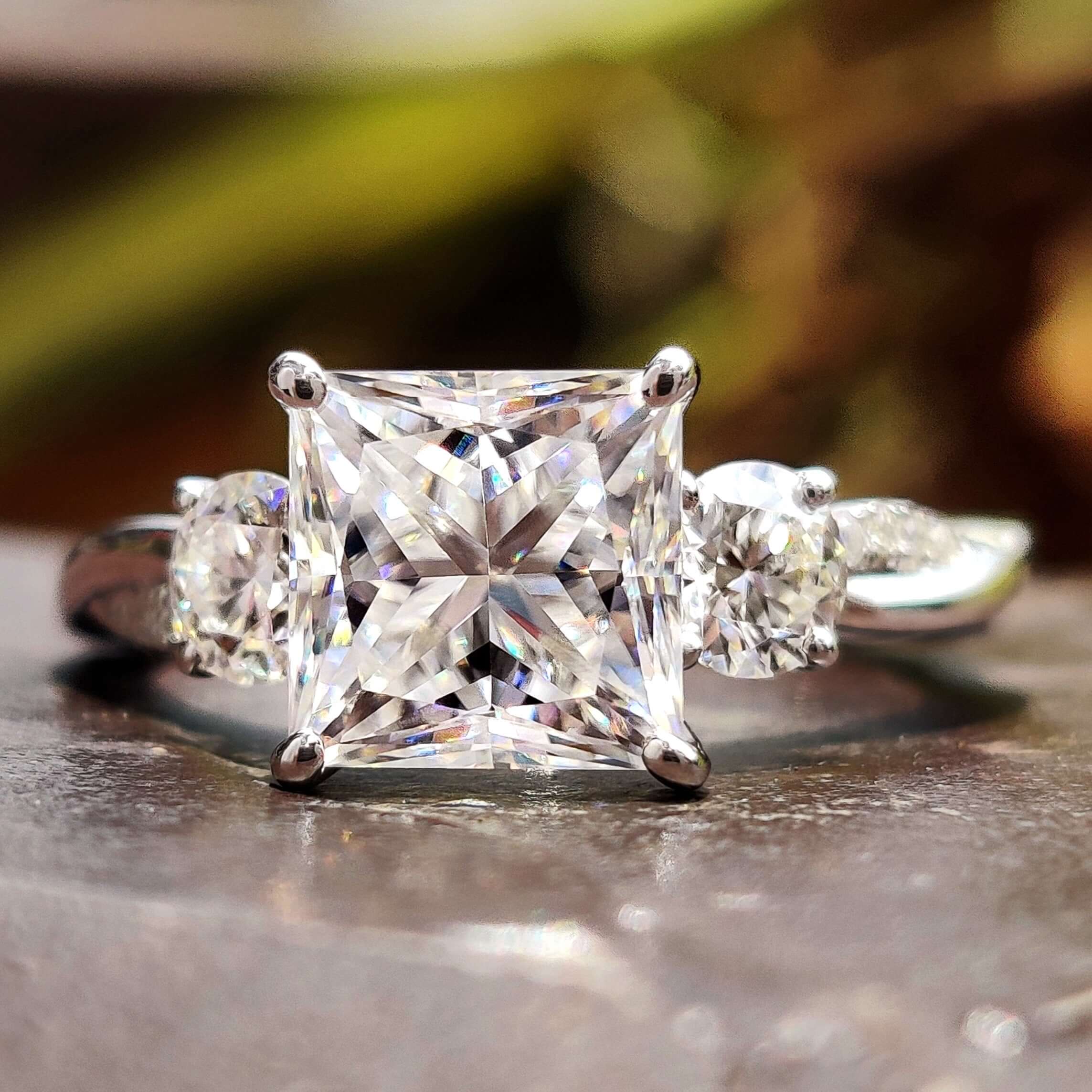 three stones moissanite engagement ring