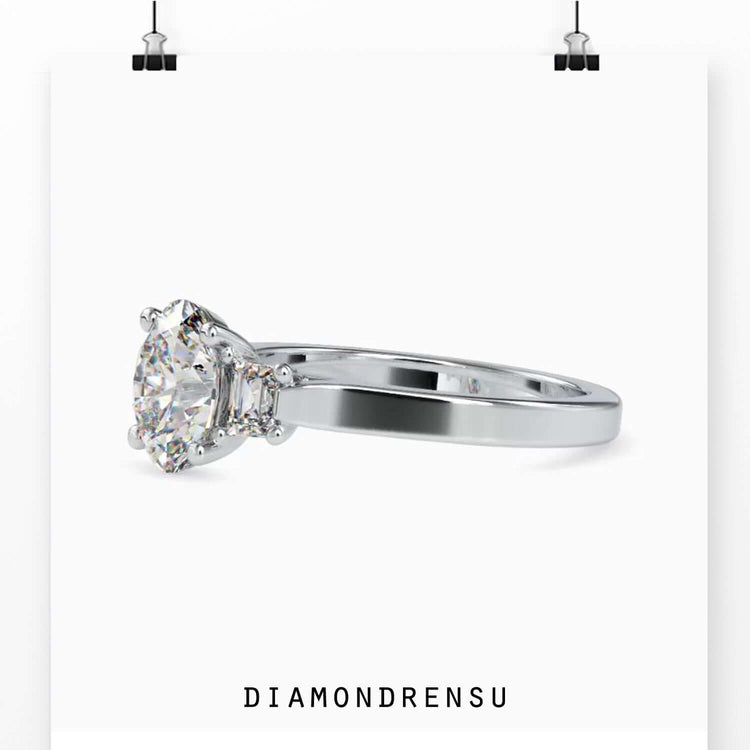 3 stone diamond ring with handmade yellow gold band.
