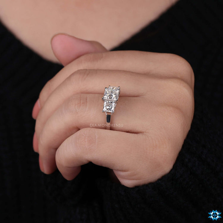 Handmade engagement ring with princess cut stone.
