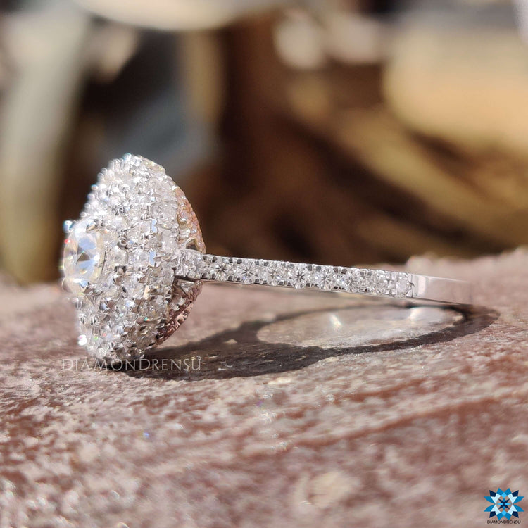 Cathedral setting engagement ring in two tone gold.
