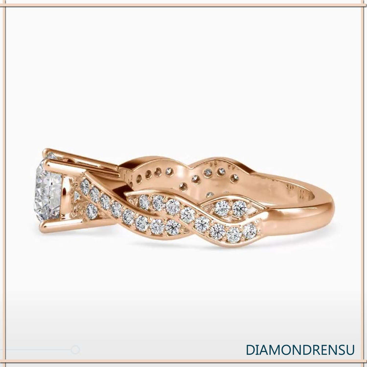 IGI certified engagement ring with round cut and twisted band.
