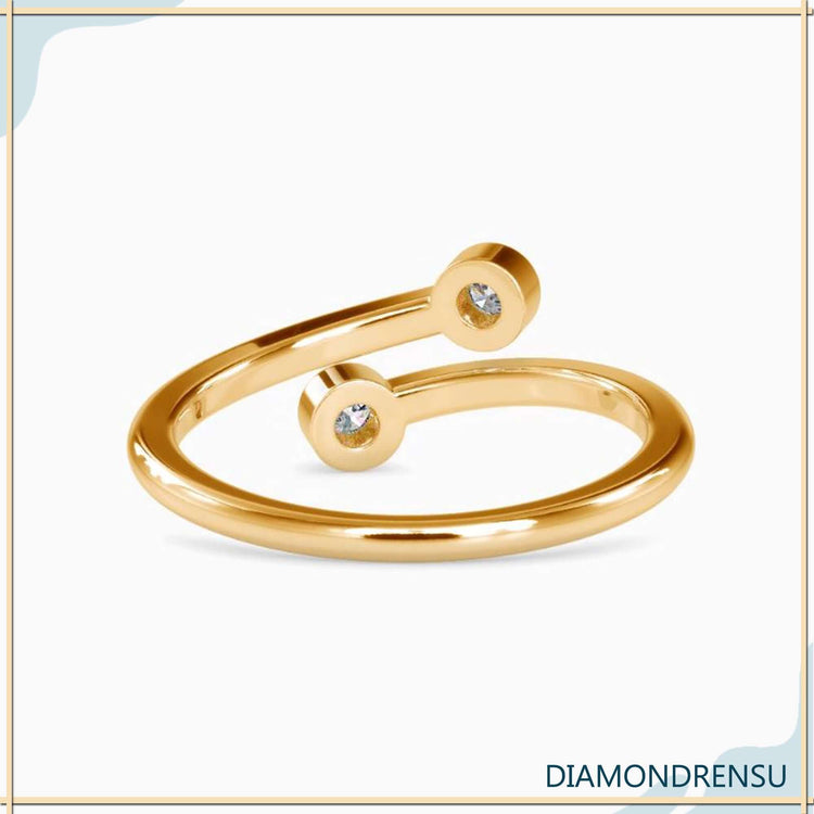 Lab grown diamond wedding band with split bypass arms.
