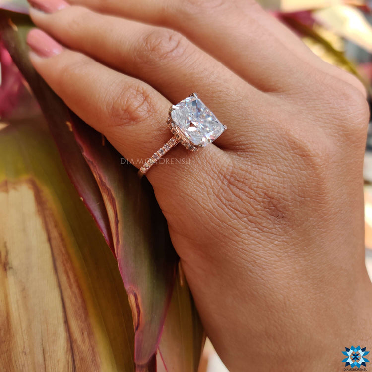 Two-tone moissanite ring in white and rose gold.
