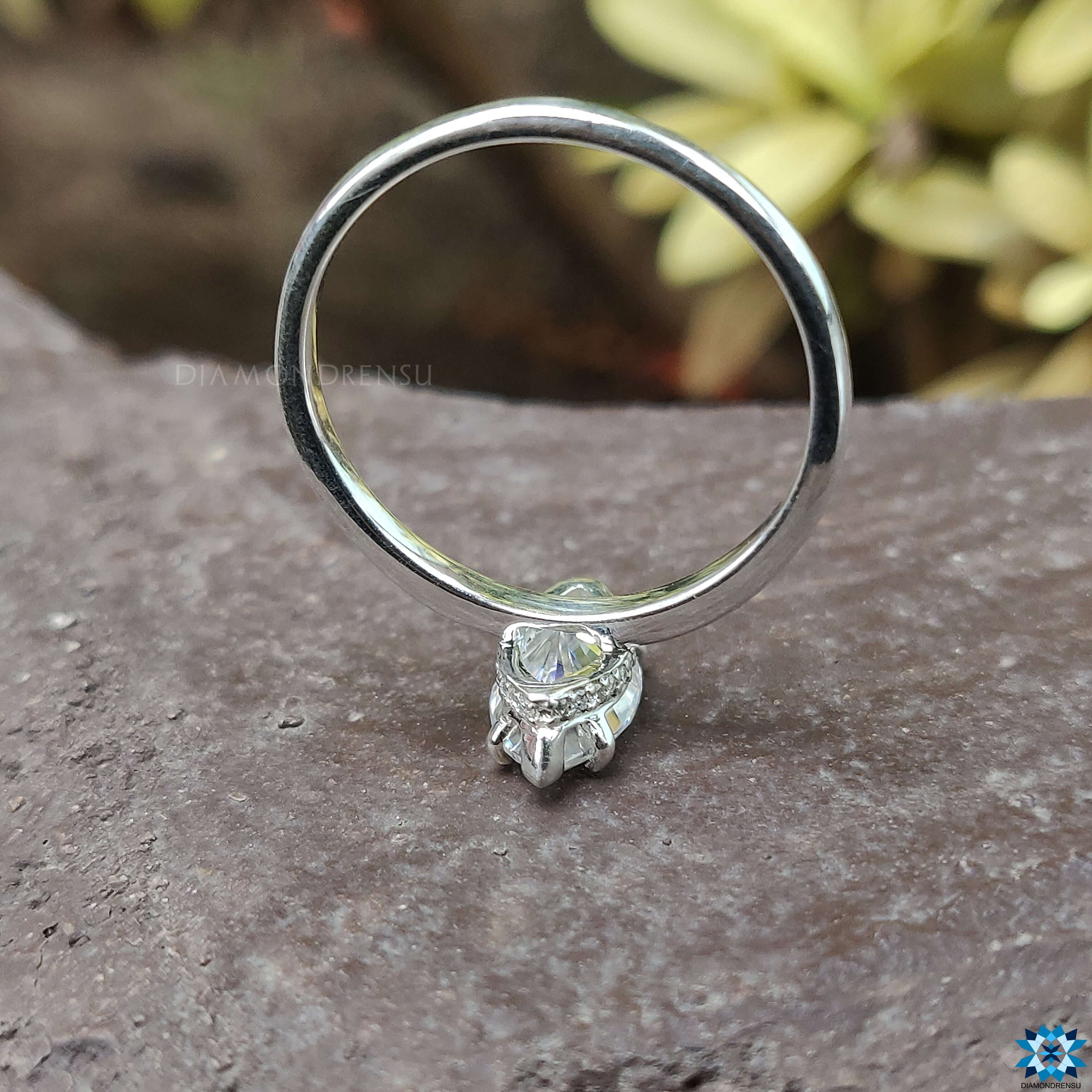 Elegant solitaire marquise engagement ring featuring a handmade design from Diamondrensu