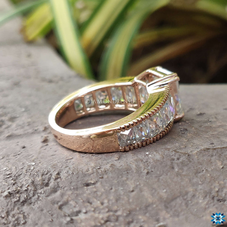 Double prong moissanite engagement ring.
