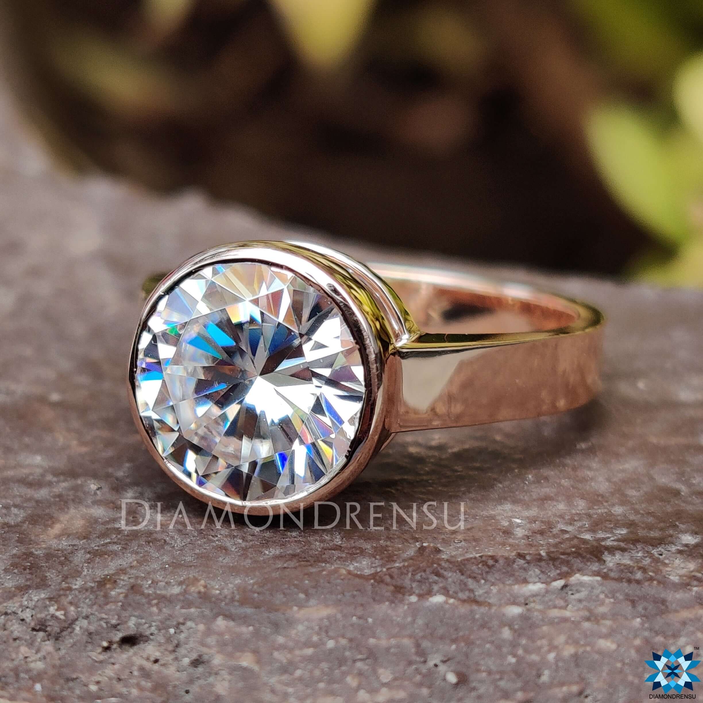 Round brilliant cut moissanite ring on finger
