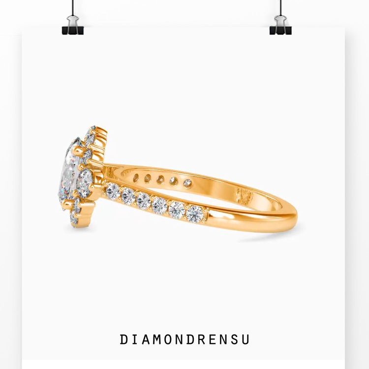 Lab grown diamond engagement ring with cluster setting in white gold.
