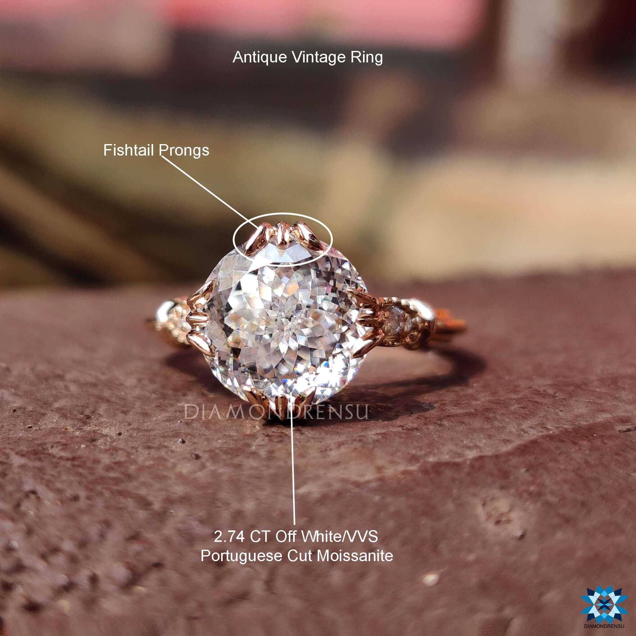 Portuguese cut moissanite in a custom vintage setting.
