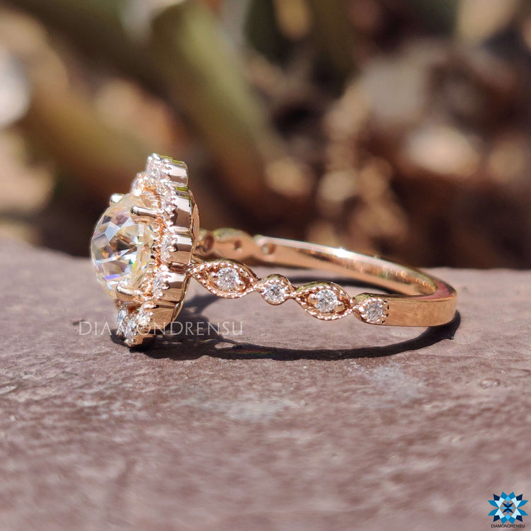 Off white moissanite ring with 4 prong setting.
