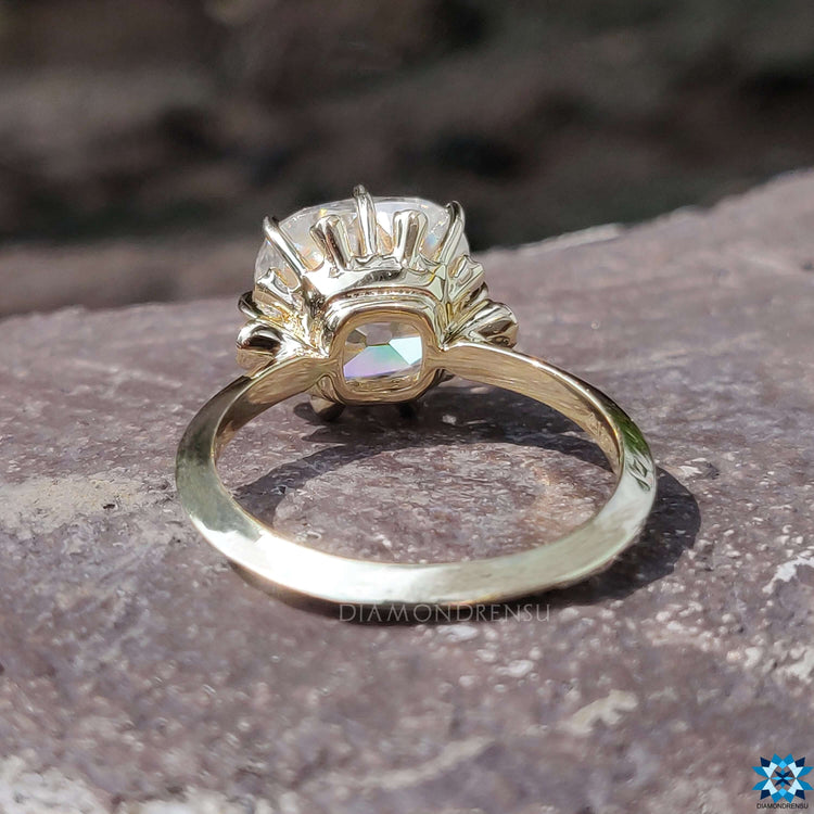 Custom vintage-style engagement ring with prong setting.
