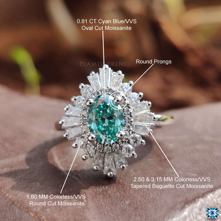 Moissanite engagement ring with mixed cut halo.
