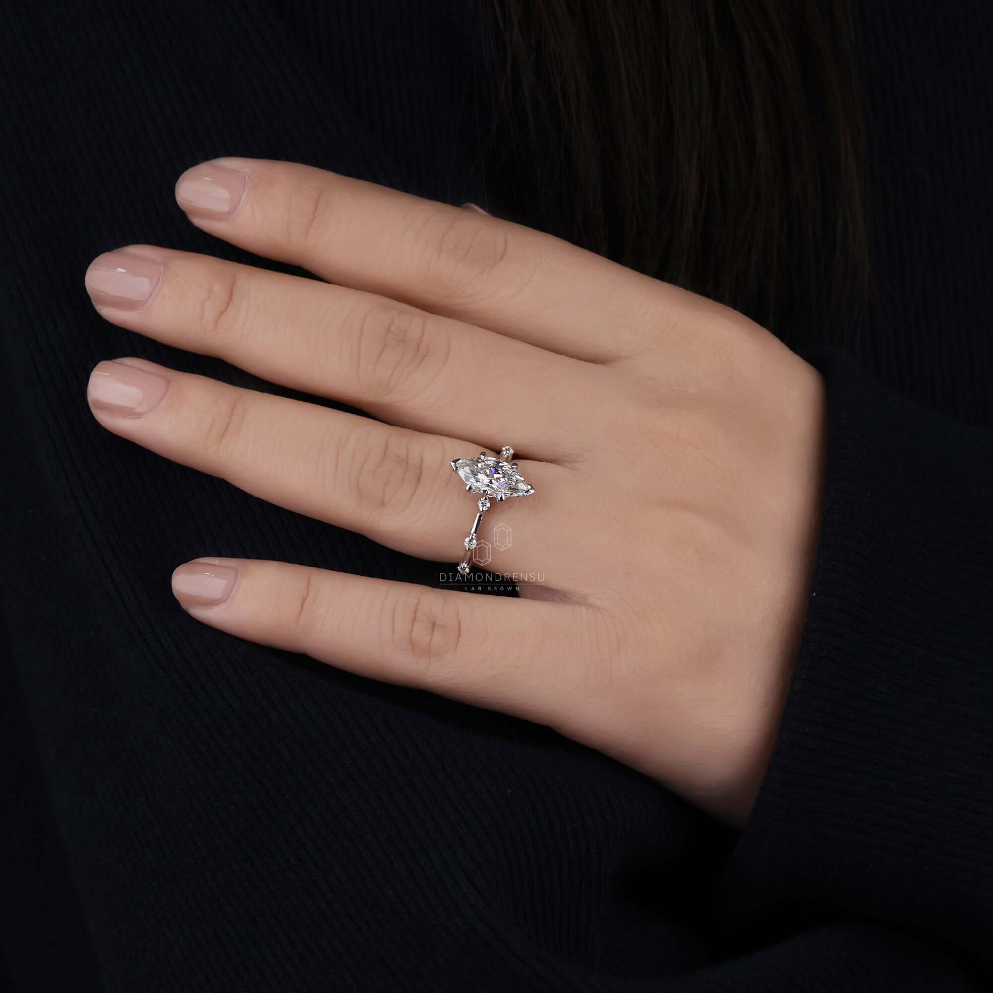 Diamondrensu ring designed with stunning claw prongs.