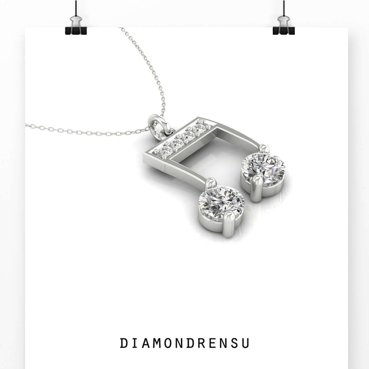 Diamondrensu UK pendant in musical theme with lab diamond.
