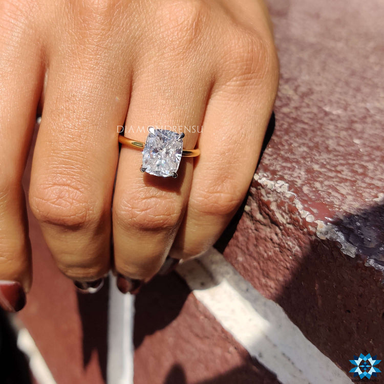 Two-tone yellow and white gold engagement ring.
