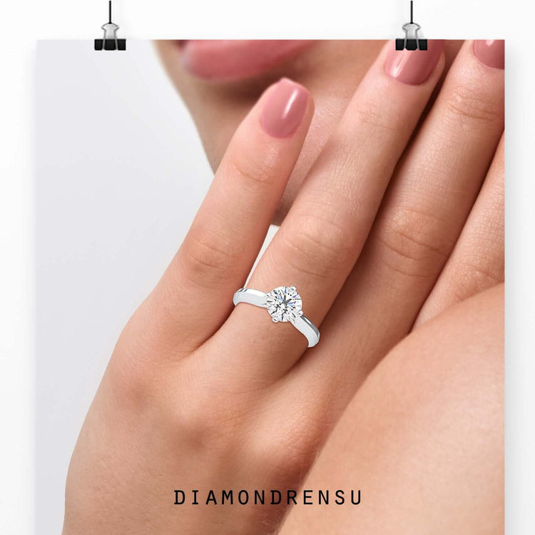 Round solitaire ring with 4 prong setting, handmade in the UK.
