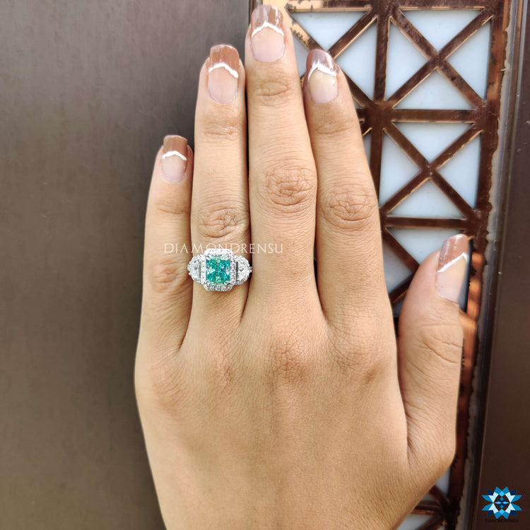 Diamondrensu UK moissanite ring with hidden halo design.
