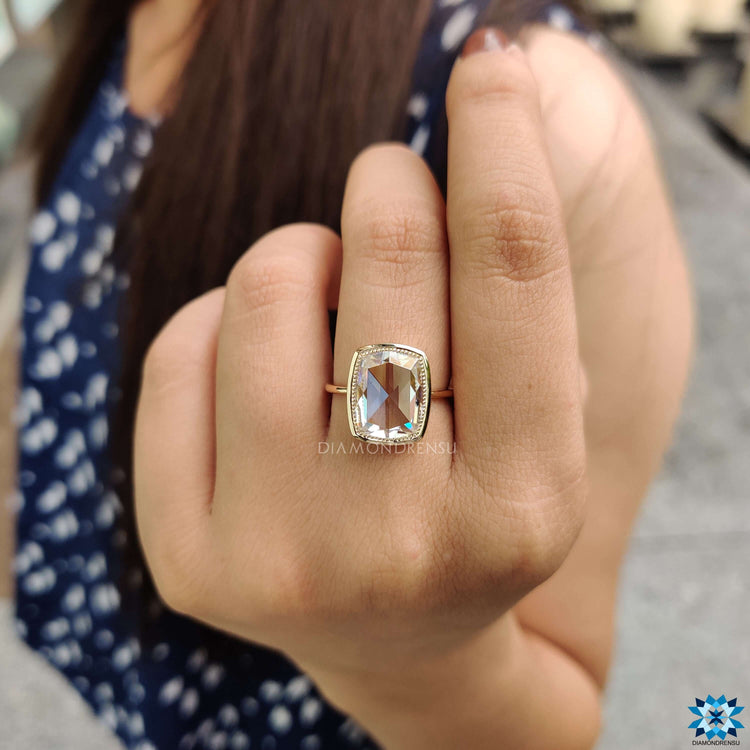 Cushion rose cut moissanite ring with milgrain setting.
