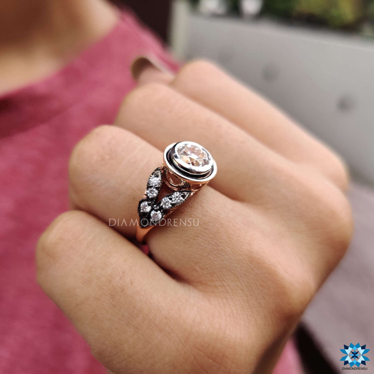 Rose gold ring with vintage style old mine cut moissanite.

