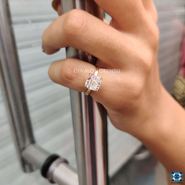 Handmade jewellery featuring a classic cushion cut solitaire ring.
