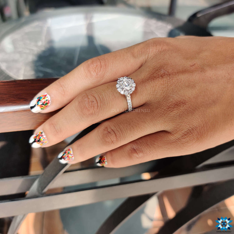 Round cut moissanite ring set in a classic and sophisticated design.
