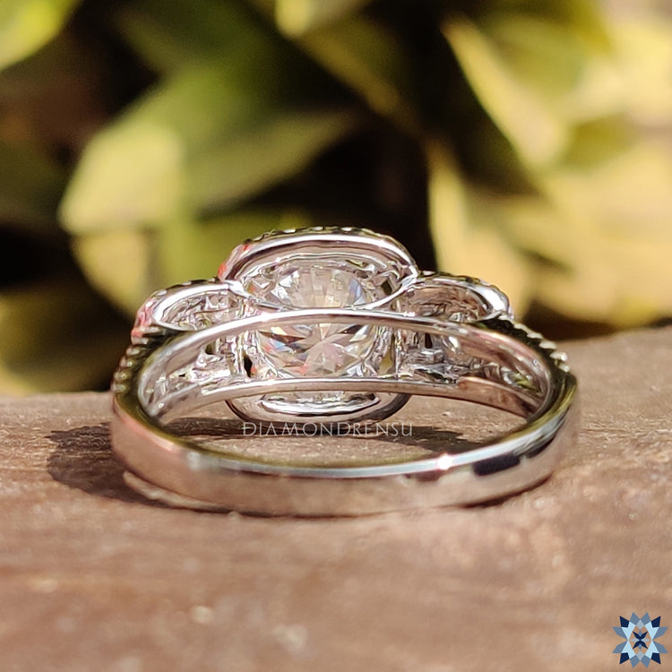 Halo moissanite ring with split shank pave design.
