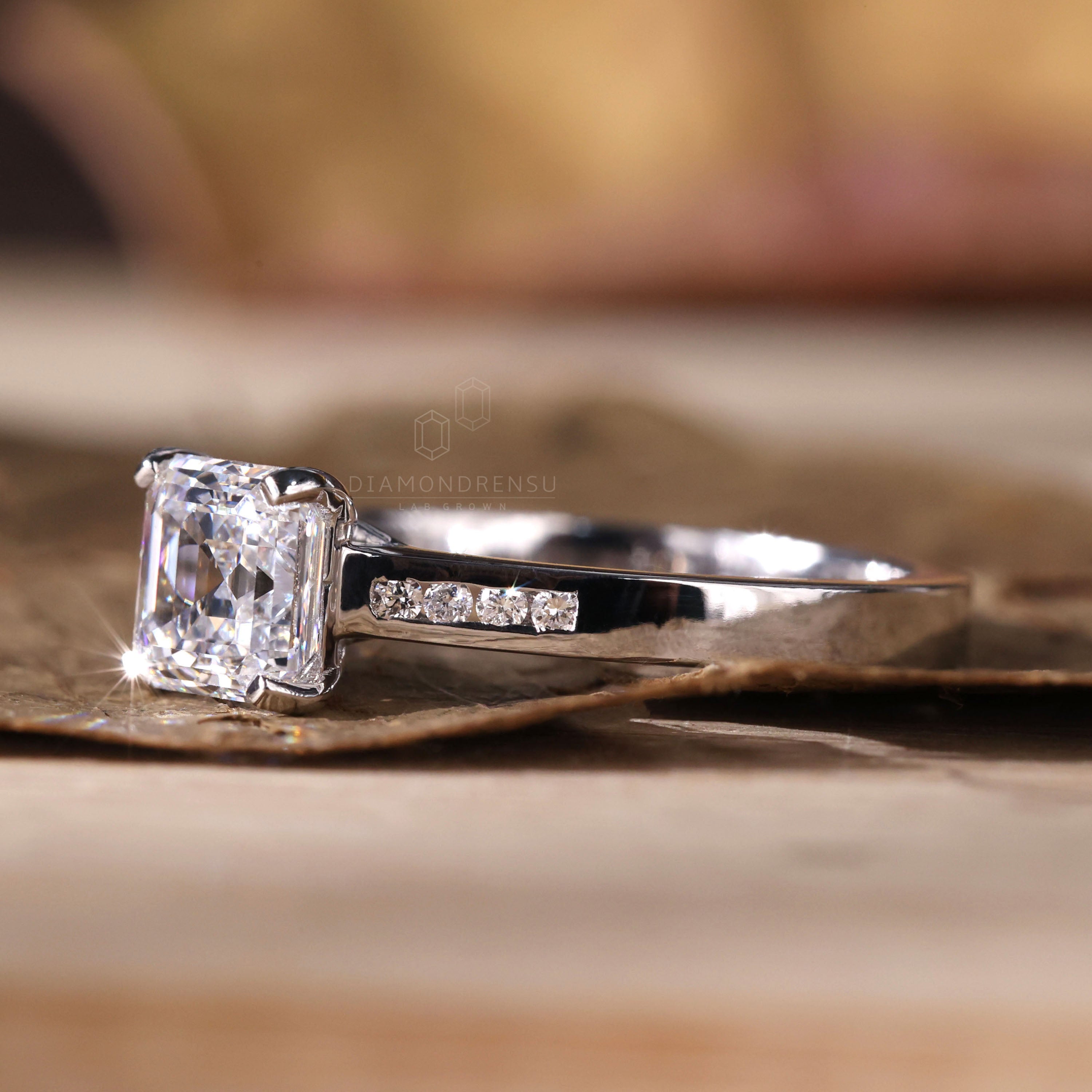 Lab grown diamond in a delicate channel ring setting.