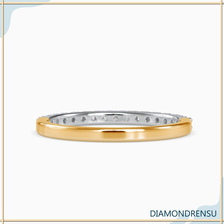 Lab grown diamond wedding band in half eternity style.
