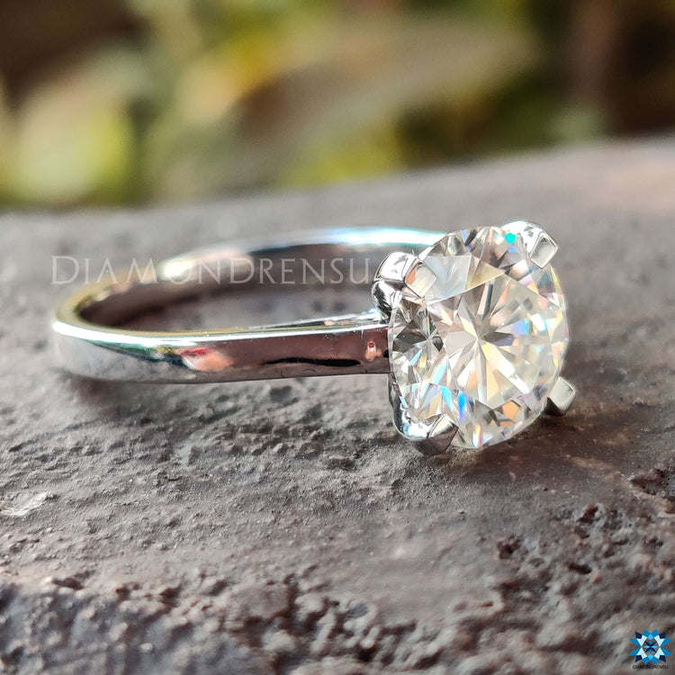 Cathedral setting moissanite ring.
