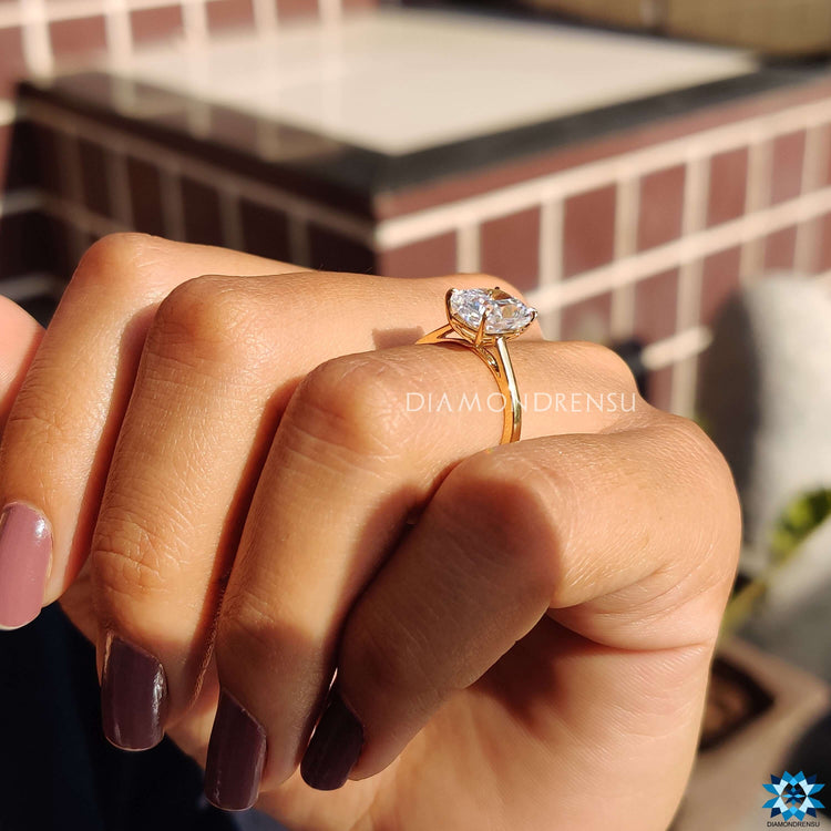 Elongated cushion solitaire ring ideal for custom proposals.
