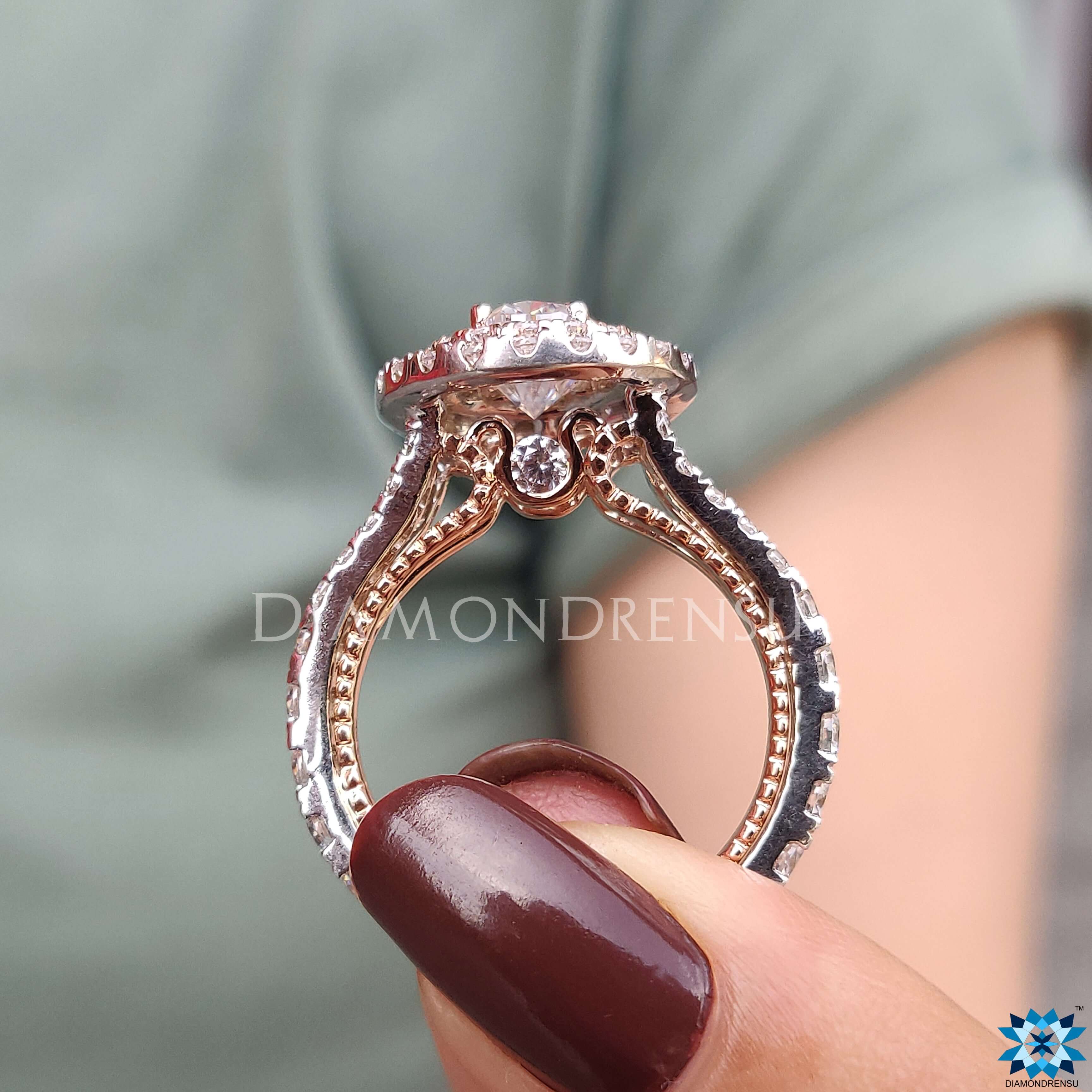 Oval Moissanite Ring set in a beautiful split shank pave engagement ring.