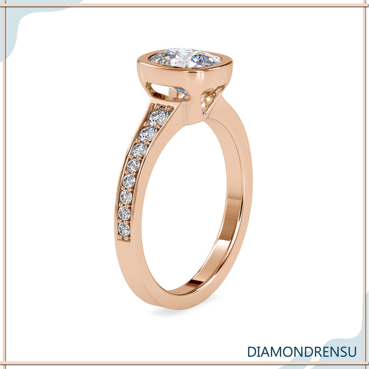 Buy diamond ring with cushion cut in bezel setting.
