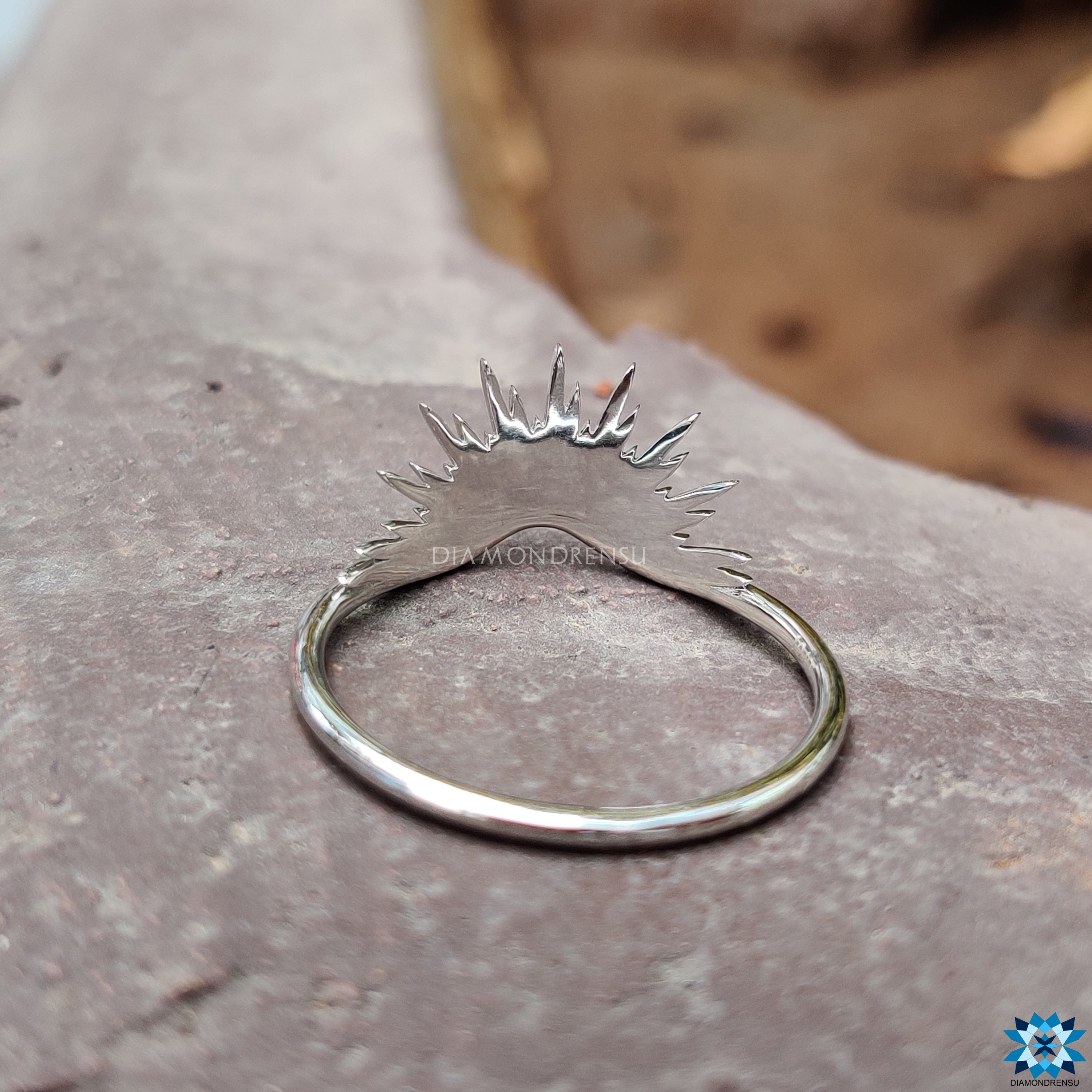 Handmade curved ring band in white gold, perfect for stacking.