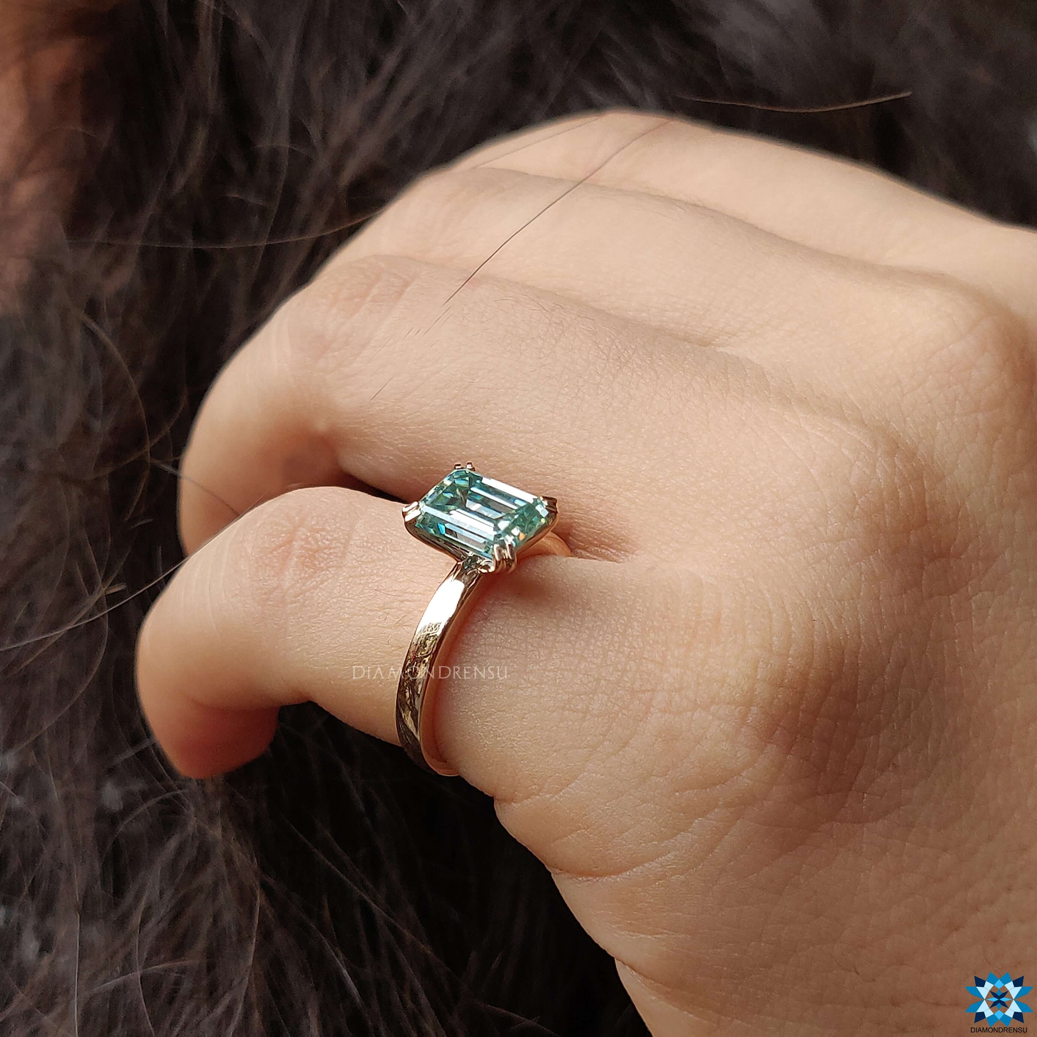 Shop to buy moissanite ring featuring an elegant emerald cut design.