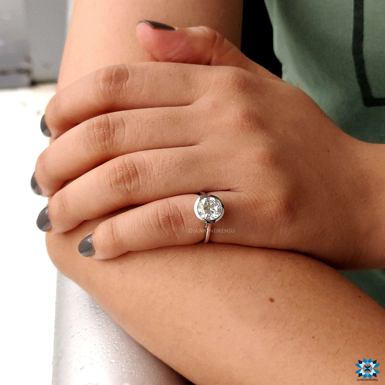 Handmade moissanite solitaire engagement ring.
