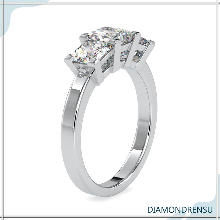 Buy diamond ring with princess cut centre and v-shaped prongs.
