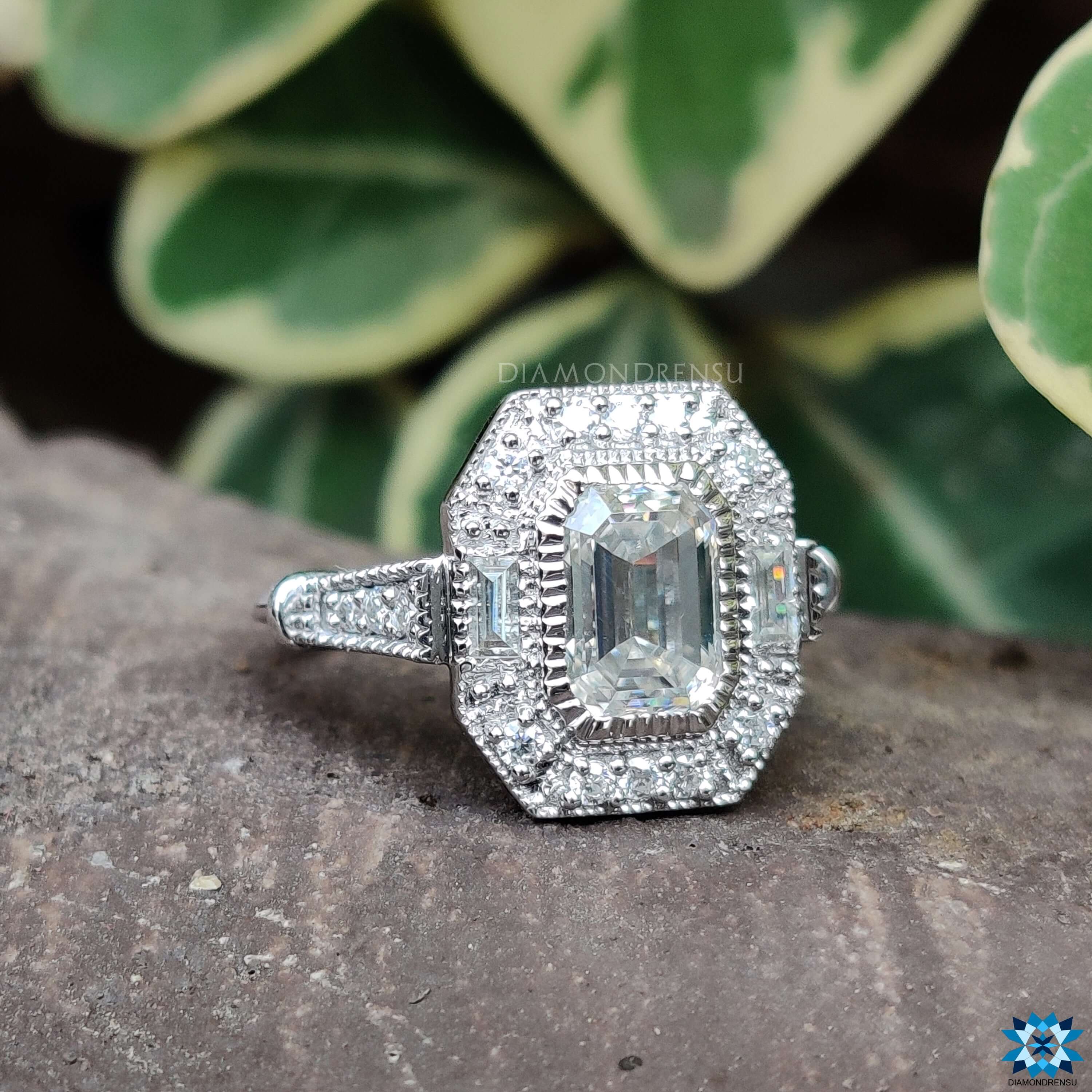 Beautiful vintage ring featuring an emerald cut ring and detailed milgrain.