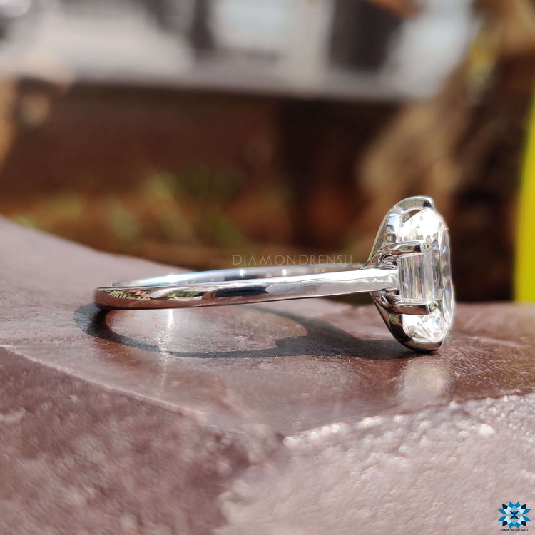 Cathedral setting ring featuring cushion criss cut stone.

