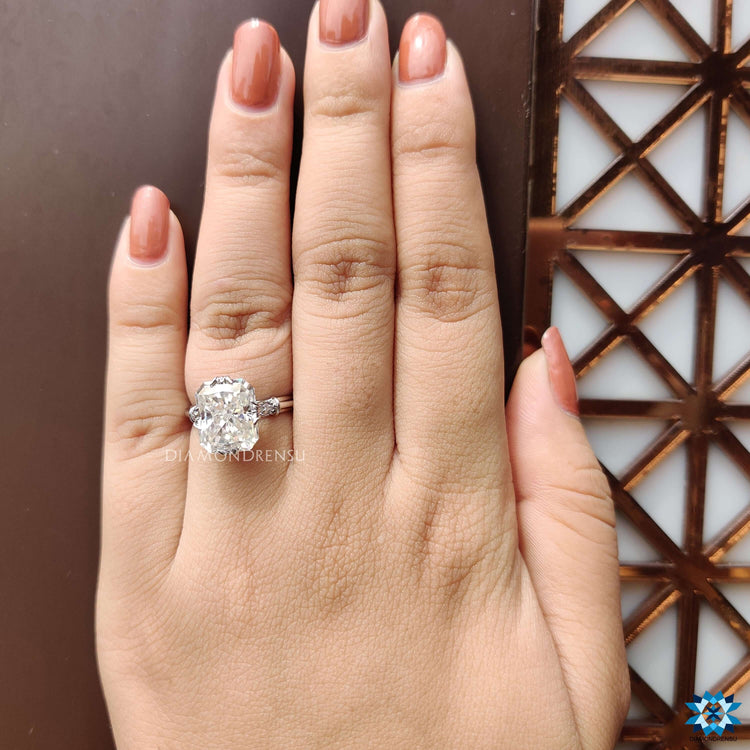 Diamondrensu UK radiant moissanite ring with prong setting.
