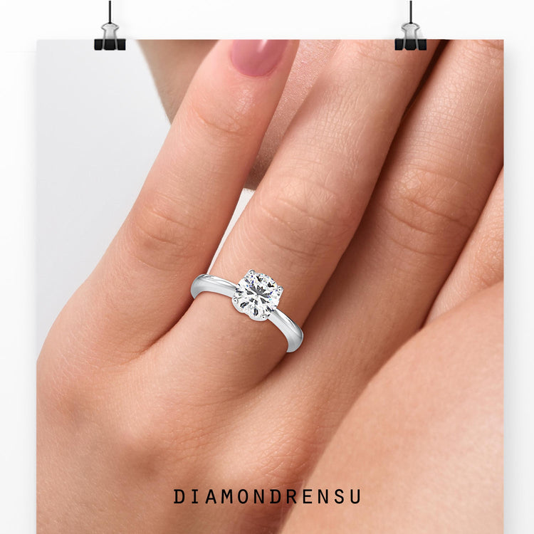 Round diamond ring with custom solitaire setting.
