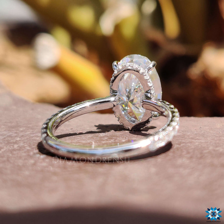 White gold ring with 4 prong claw setting.
