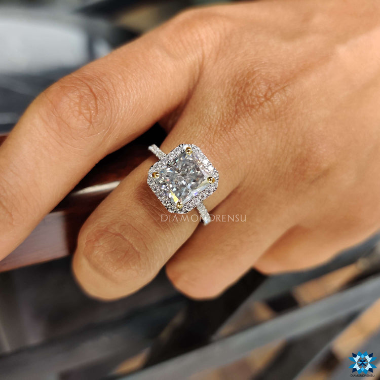 Pavé band ring with radiant moissanite and hidden side stone.
