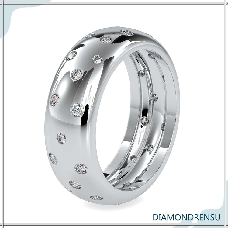 Diamond wedding band in a flush setting with white gold.
