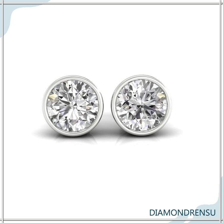 Rose gold bezel set round diamond stud earrings by Diamondrensu UK.
